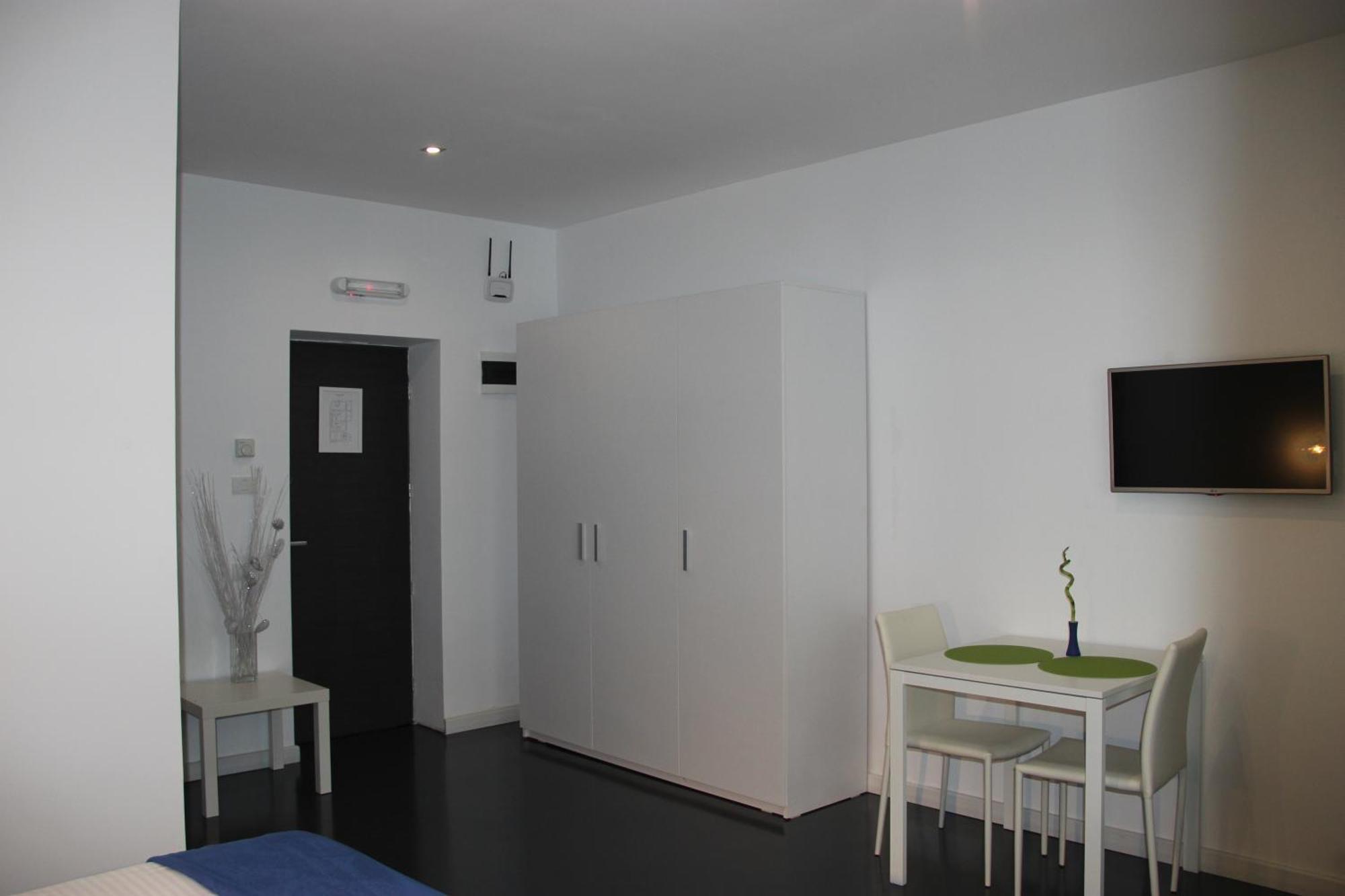 Living Aparthotel Boekarest Kamer foto