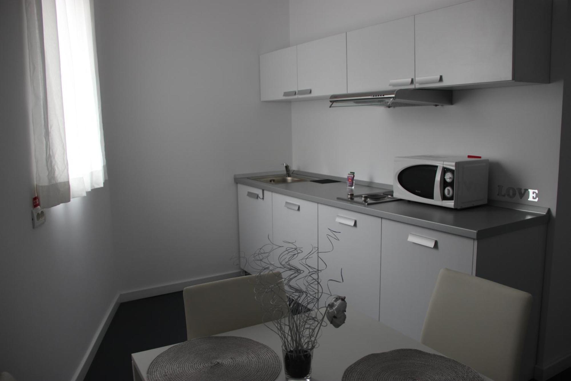 Living Aparthotel Boekarest Kamer foto