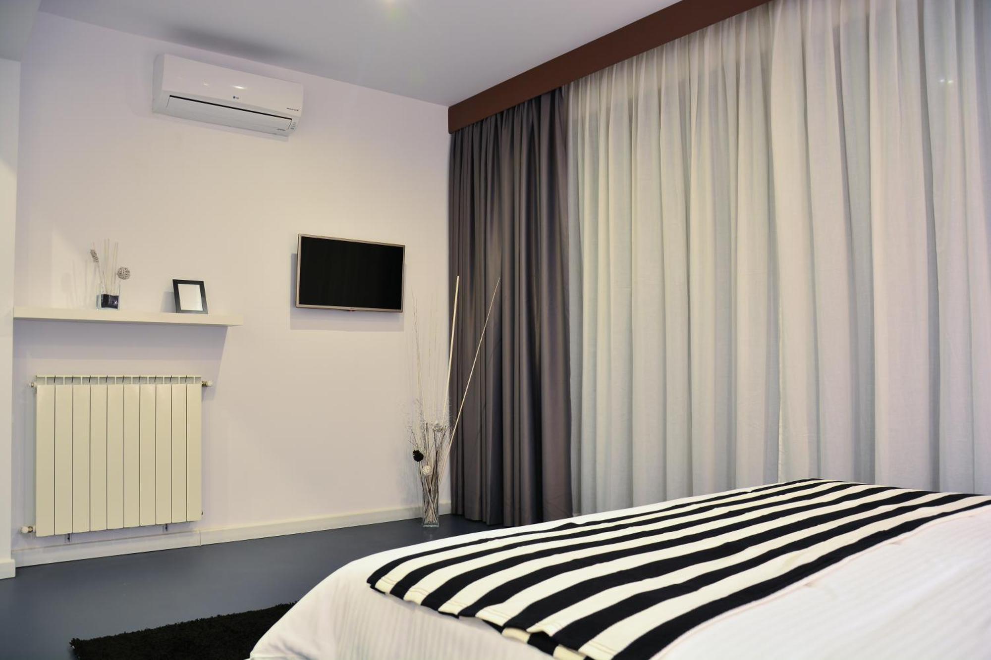 Living Aparthotel Boekarest Kamer foto