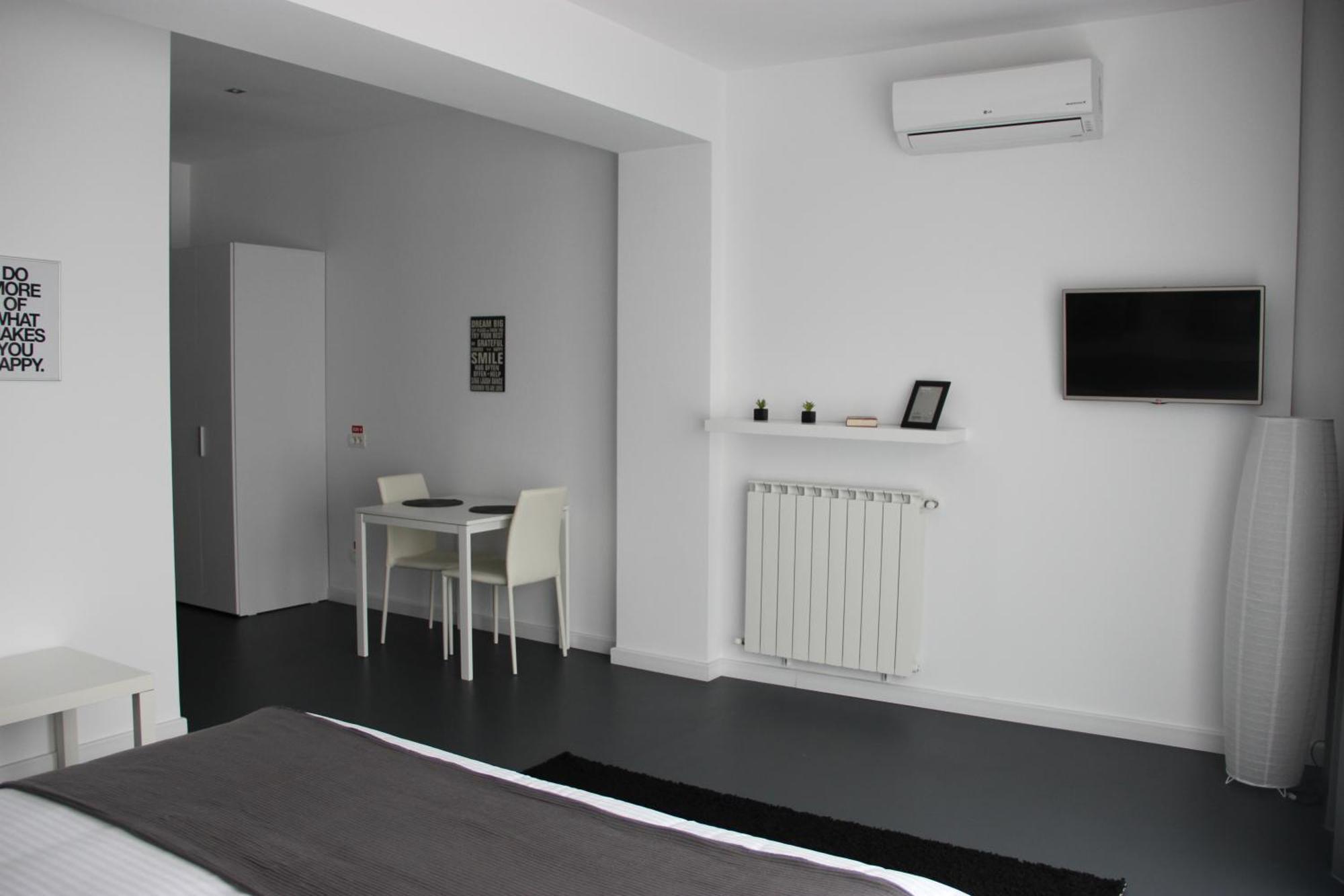 Living Aparthotel Boekarest Kamer foto